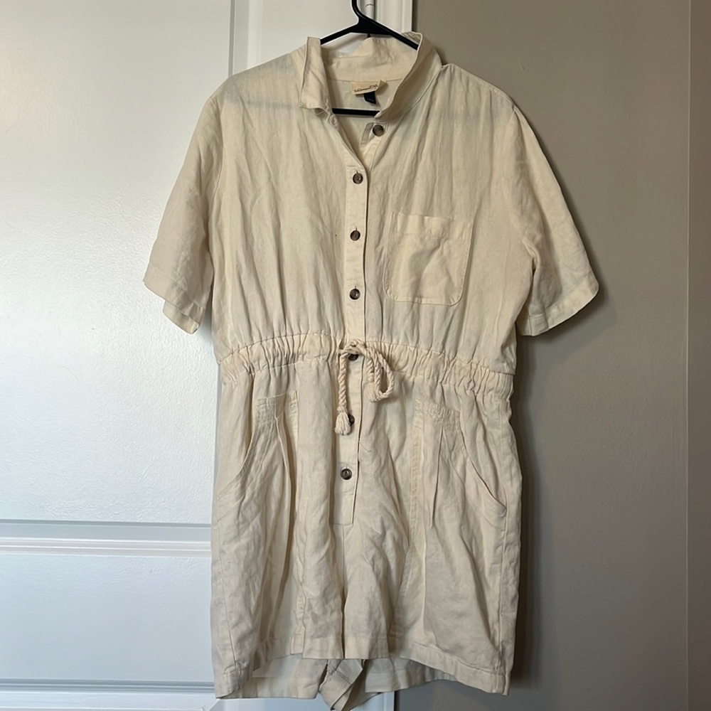 Cream colored romper size large.